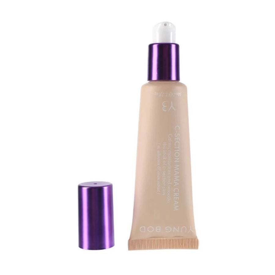 A beige tube of C-Section Mama Cream from the brand Yung Bod, designed to improve the appearance of c-section scars. The tube has a purple cap, which is removed and placed next to it, revealing a white pump dispenser. This scar-softening cream boasts natural ingredients for gentle yet effective care.