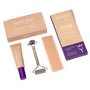 The C-Section Scar Bundle by Yung Bod is a skincare collection specifically crafted for postpartum scar care. This set features a cream with natural ingredients, alongside a roller and silicone strips, all elegantly packaged in beige and purple and beautifully presented against a white backdrop.