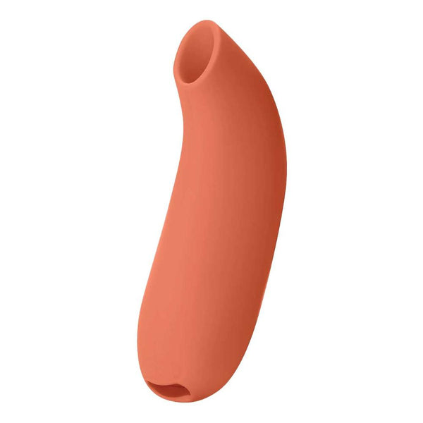 The Dame Aer, an external suction device by Dame, is a stylish sex toy crafted from vibrant orange silicone. Its curved, ergonomic design incorporates air-pulse technology with a hollow opening at one end. Made from waterproof silicone, it guarantees clitoral pleasure with ease of use and comfort in mind.