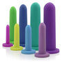 The "Intimate Rose - Silicone Vaginal Dilators - Full Set" features seven vibrantly colored cylindrical items made from medical-grade silicone, neatly sized from small to large with flat bases. The smooth-surfaced dilators come in shades such as purple, teal, green, and yellow to aid in pelvic health.