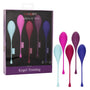 A set of five Kegel weights in a variety of vibrant colors—light blue, pink, maroon, purple, and dark blue—designed for pelvic floor strengthening. The packaging is labeled "CalExotics Tighten & Tone Kegel Training," with the weights visibly displayed next to the box.