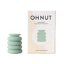 A set of four mint green Ohnut Depth-Limiting Rings from The Pelvic People is neatly stacked beside their packaging, which describes them as a customizable solution: "Customize Penetration Depth - Four Ring Buffer." These rings feature a soft, dimpled texture for a more comfortable and pain-free intimacy experience.